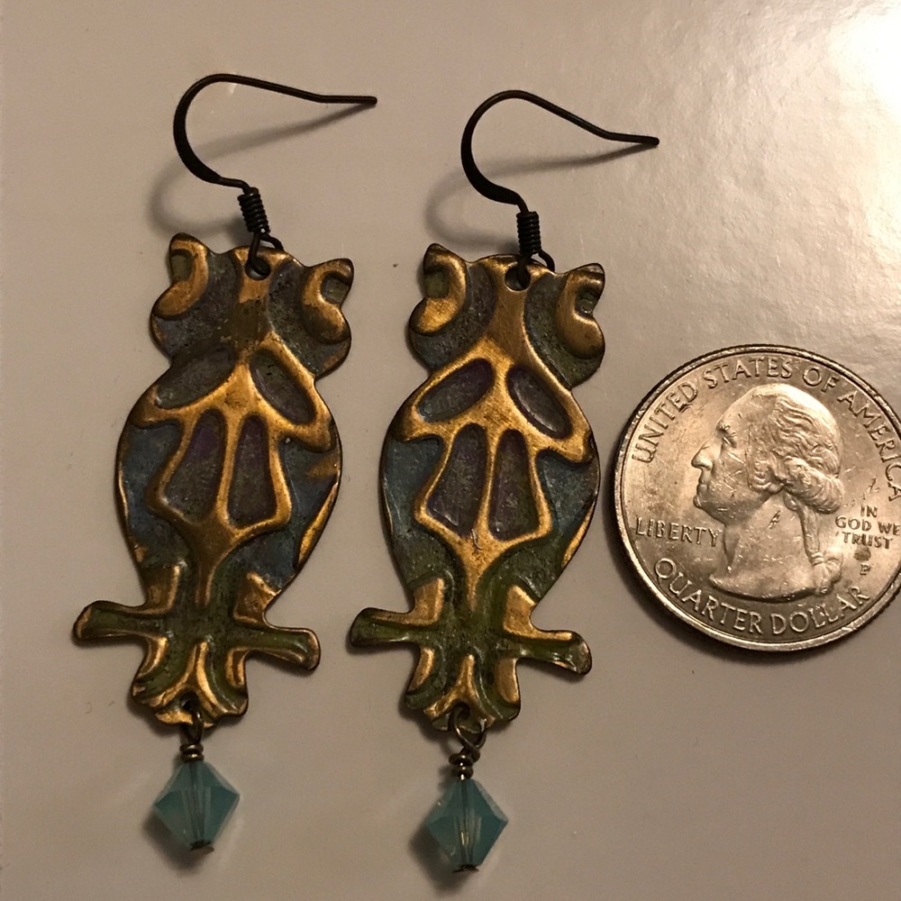 Artistic owl silhouette brass earrings